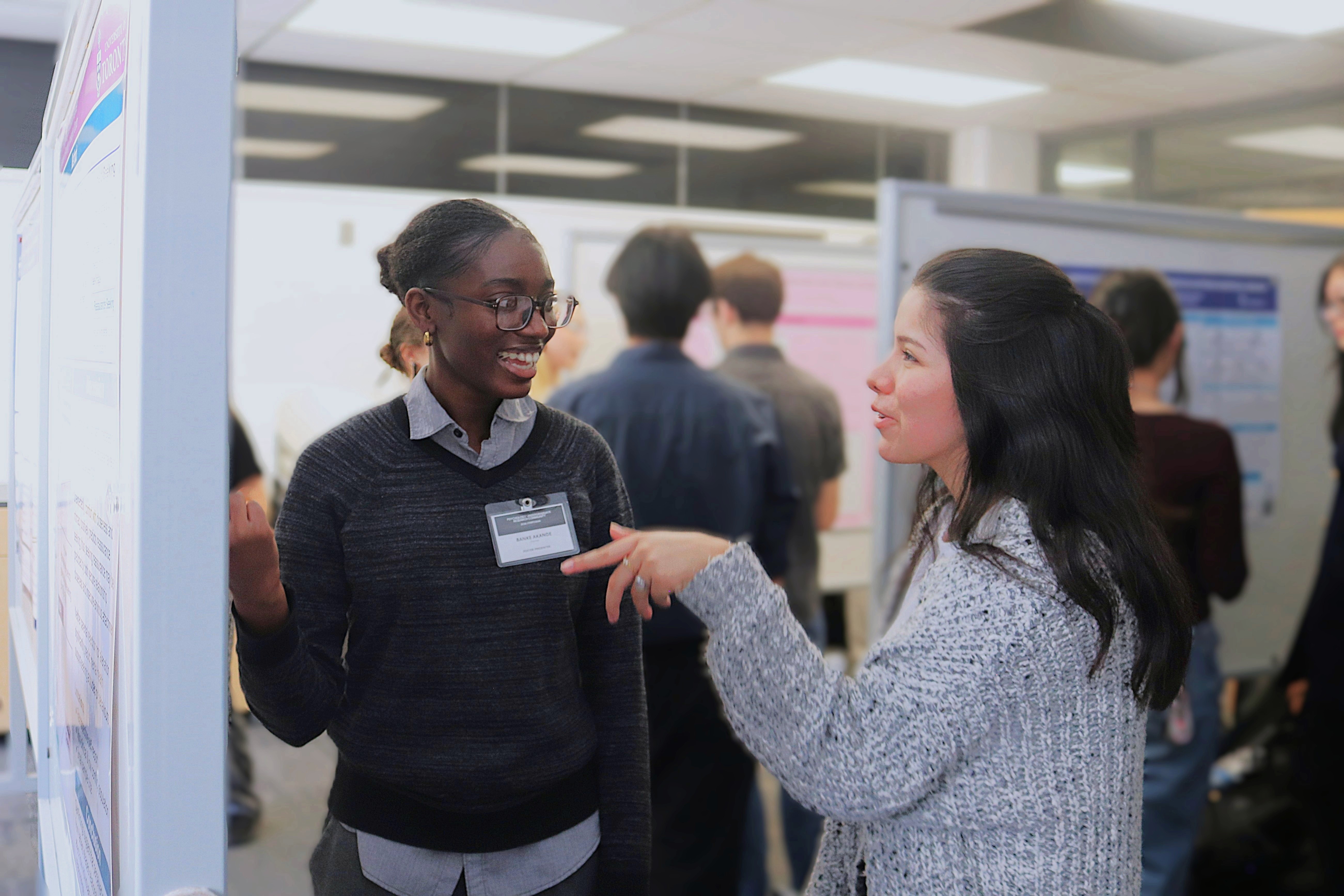 People discussing poster